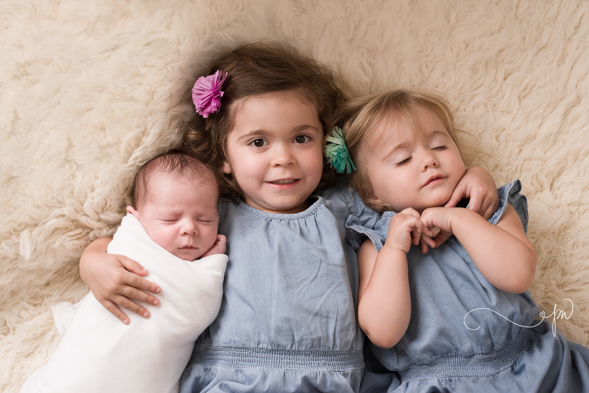 perfect 18 day old baby girl and her sweet sisters (odessa midland newborn family photographer)